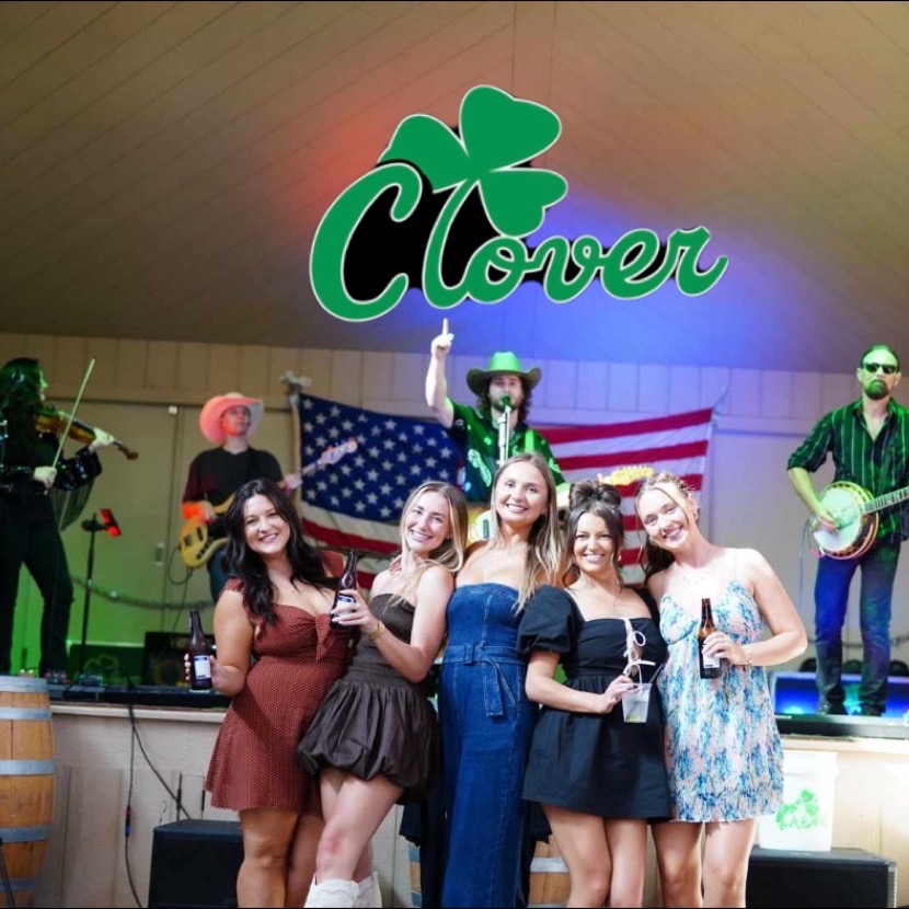 Clover performing for a lively crowd
